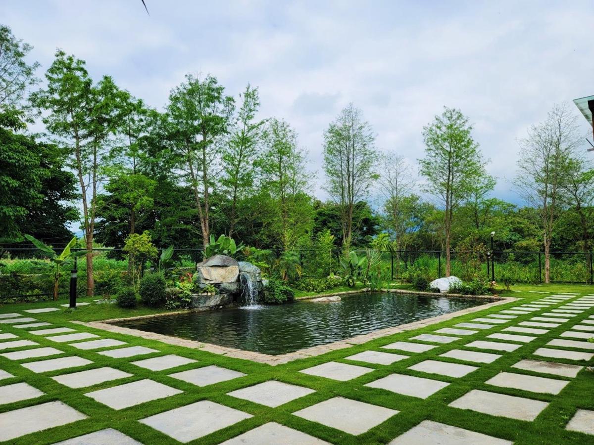 Ferienwohnung 山花映水紅莊園民宿 Yuemei Exterior foto