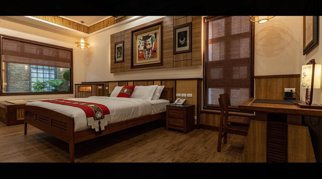 Ferienwohnung 山花映水紅莊園民宿 Yuemei Exterior foto